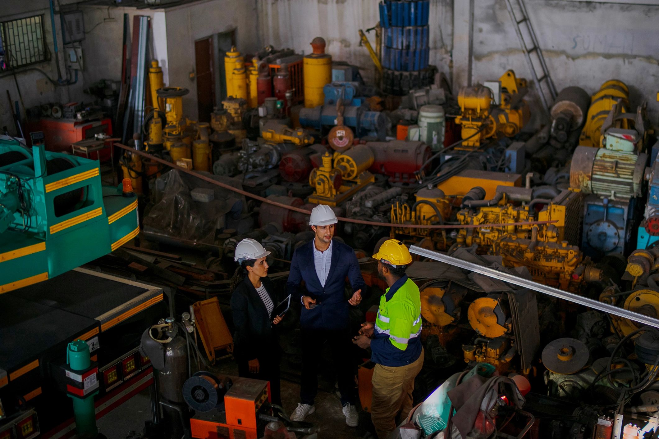 Engineer meeting with a business professional at a construction site